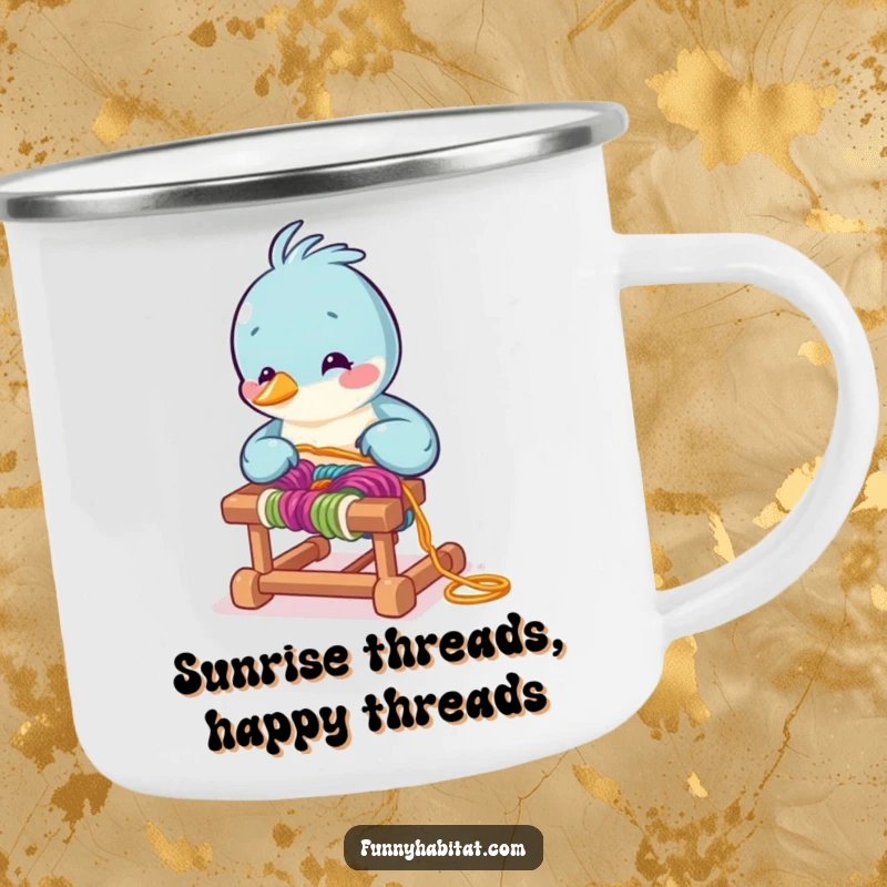 Funny bird character arranging colorful yarn on a miniature loom, a sturdy and humorous enamel camping mug for crafters.