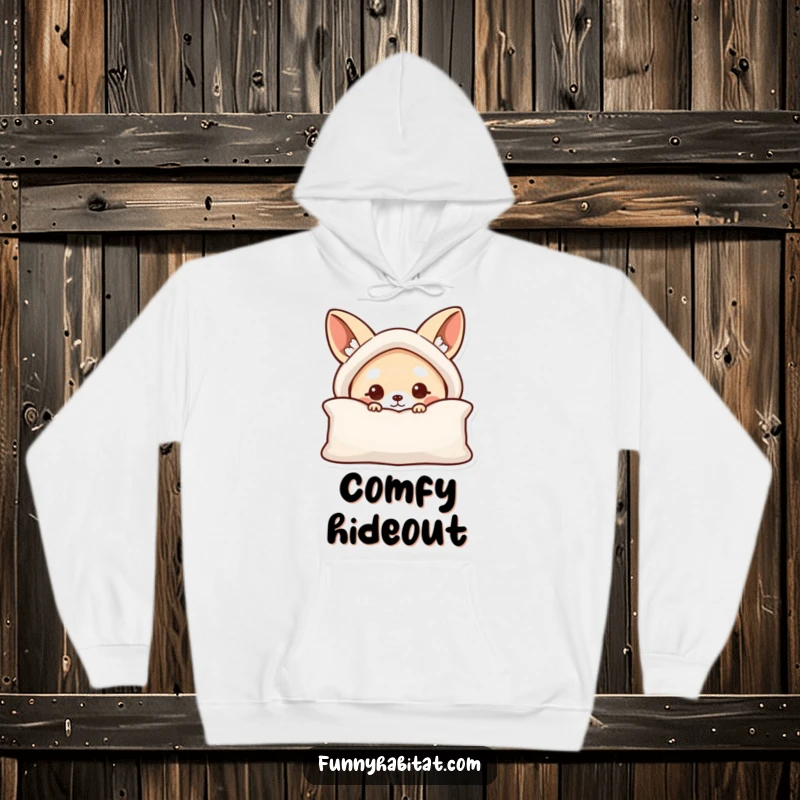Funny hoodie featuring a curious animal character peeking from behind a cushion, promoting comfort and fun.