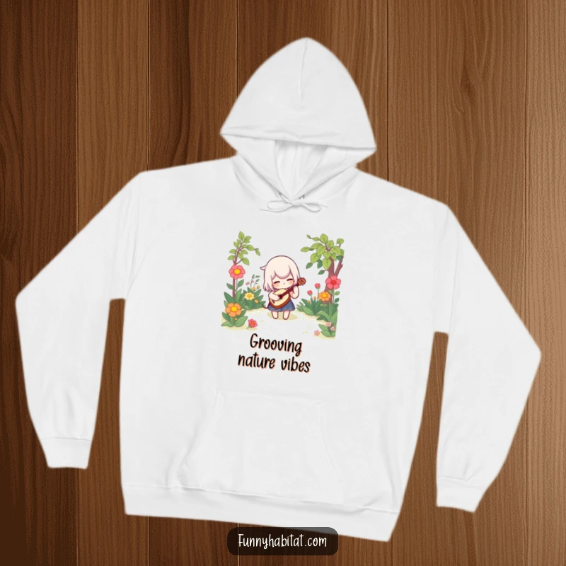 Funny hoodie depicting a character playing a whimsical instrument in a lush garden, perfect for cozy days filled with nature's music.