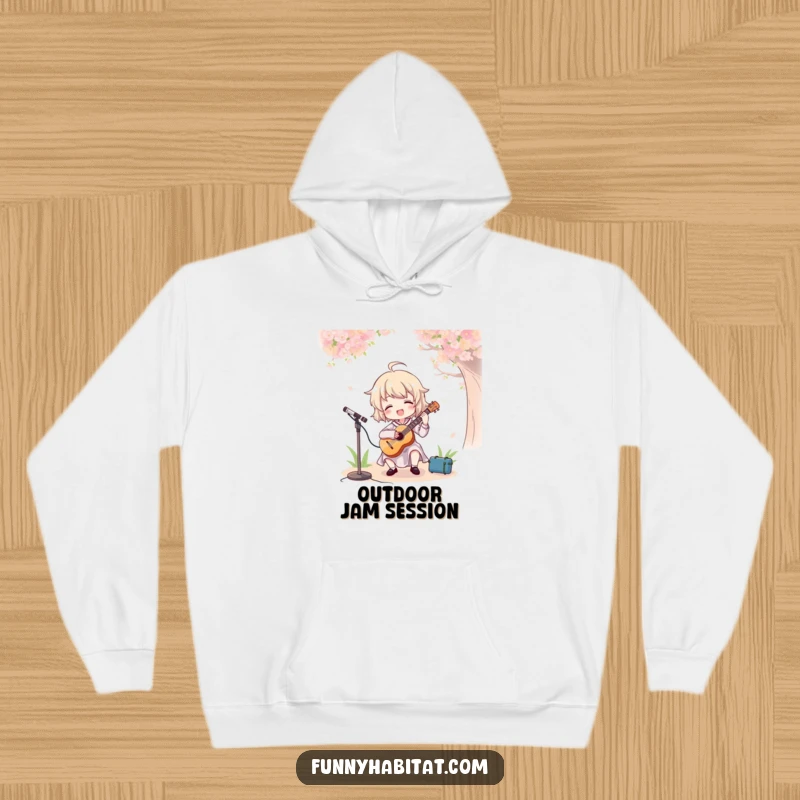 Funny hoodie showing a character joyfully strumming a ukulele in a forest, capturing the fun of outdoor music.
